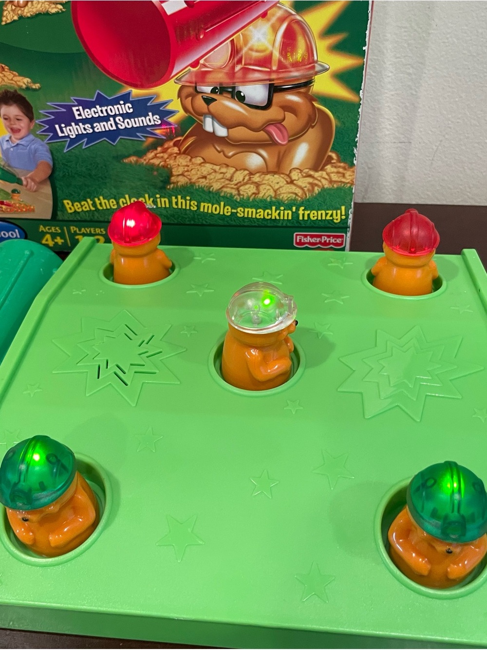 Fisher-Price Green Electronic Whac-A-Mole Game with Red and Green Light-Up Moles